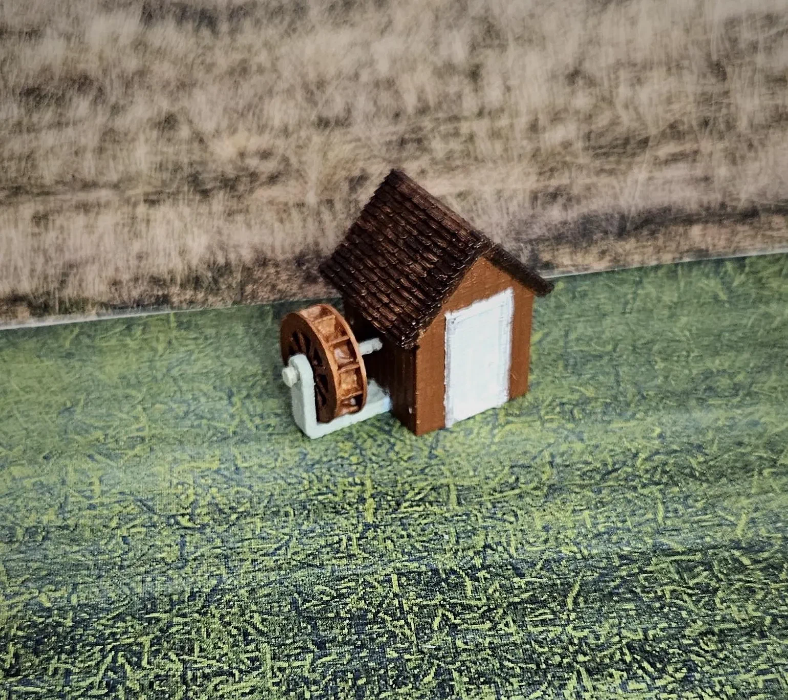 Roof detail on N scale waterwheel with small building